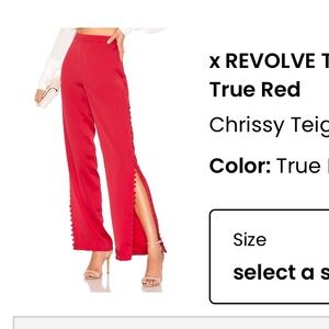 REVOLVE Chrissy Teigan red flare pants. Buttons down side